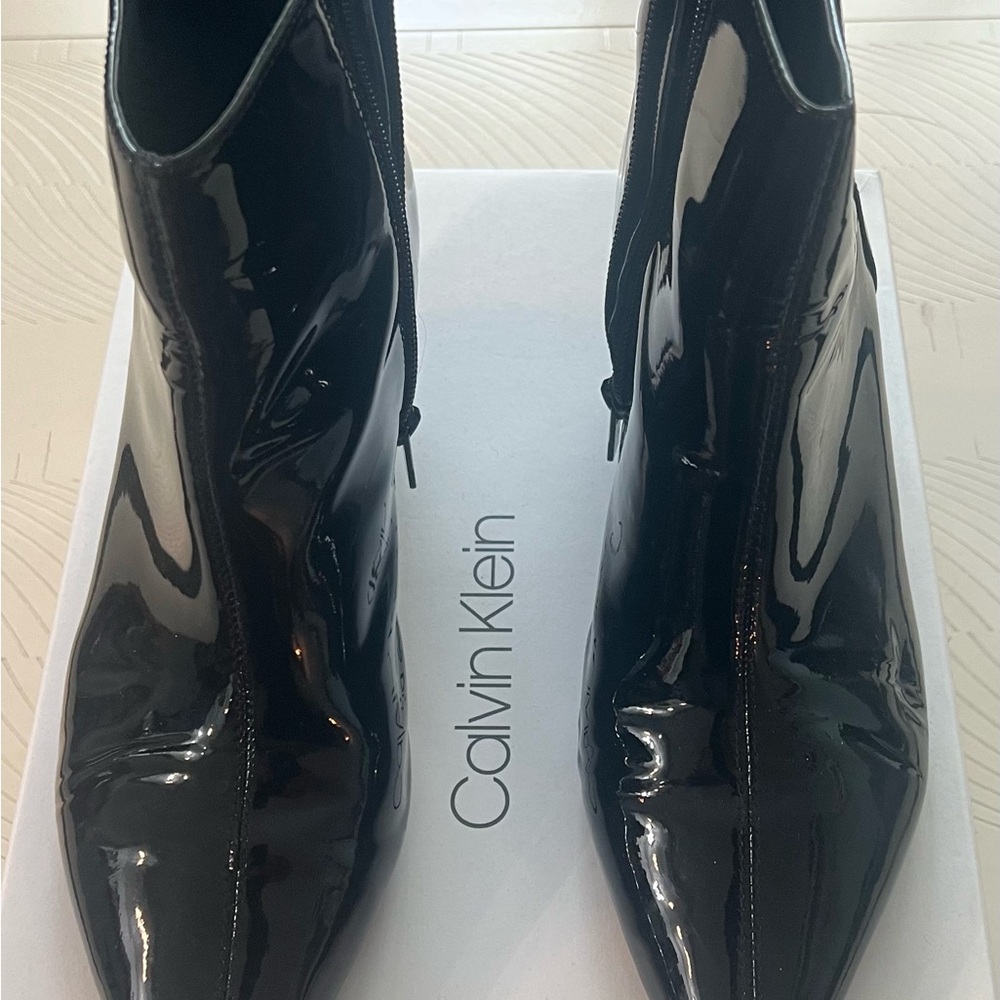 Calvin Klein Glossy Black Ankle Booties